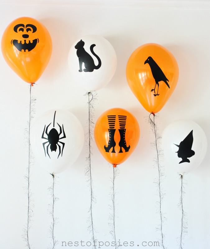 DIY Halloween Silhouette Balloons.  Fun for parties & for the kids to decorate!  via Nest of Posies