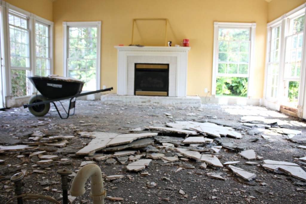 Tearing up tile to replace with Hardwood floors