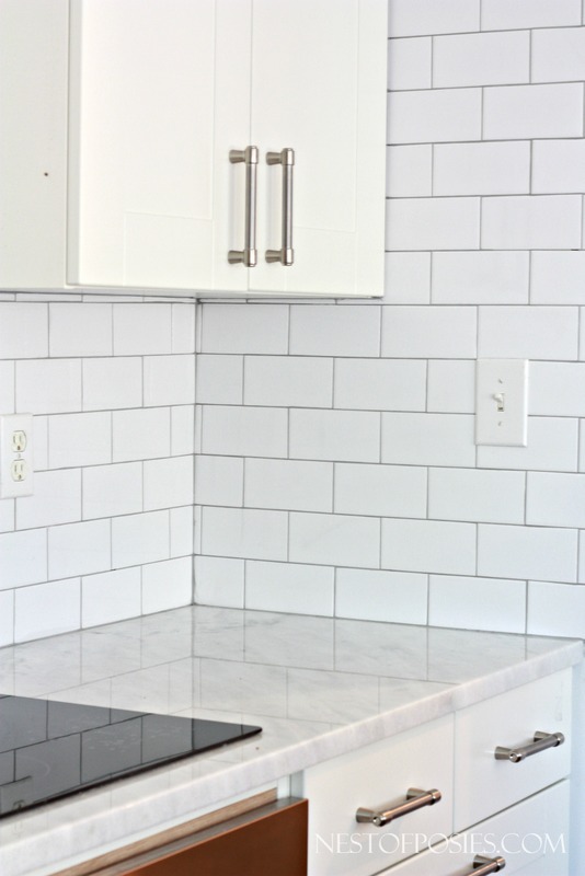 Silver grout with white Subway tile