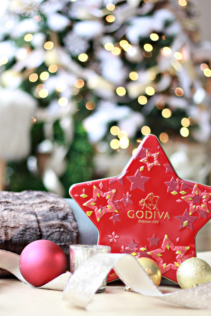 Give the gift of Luxury. A gift box of Godiva Chocolate, a candle and a beautiful faux fur blanket