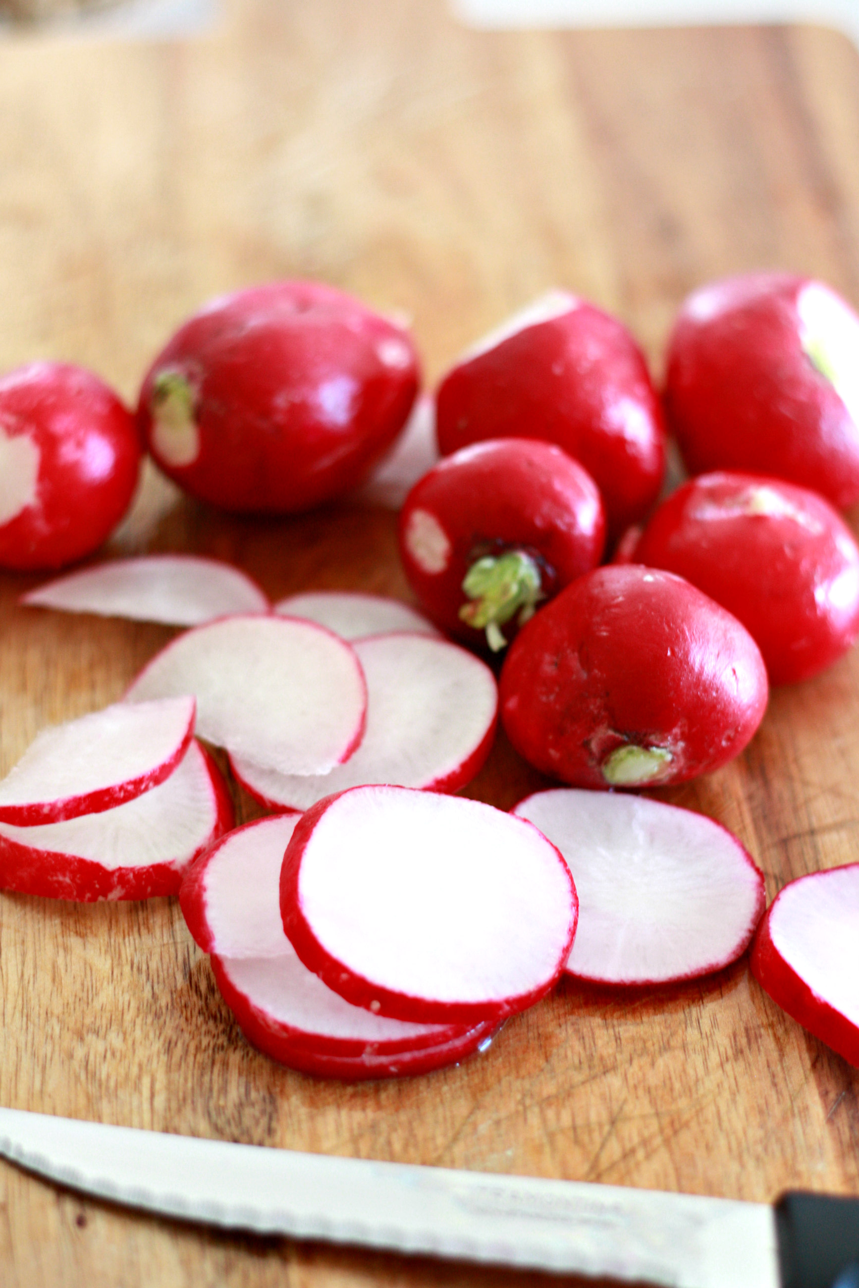 Sliced radishes for Zuppa Keto Soup Nest of Posies